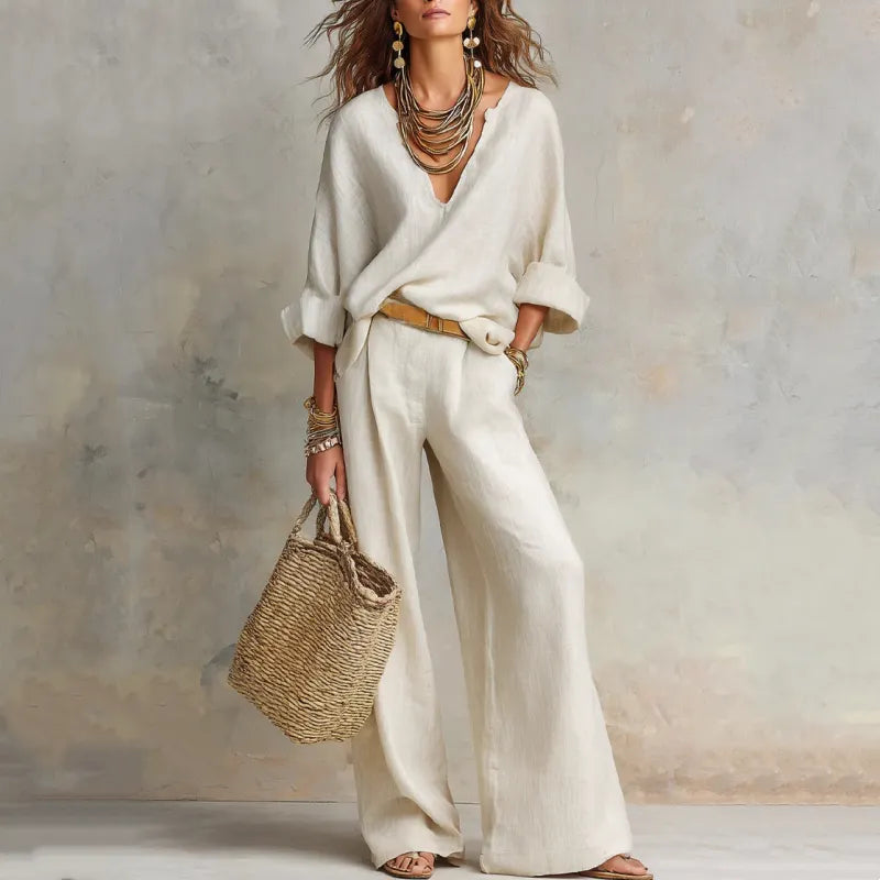 Woman wearing relaxed V-neck two piece set with wide-leg trousers