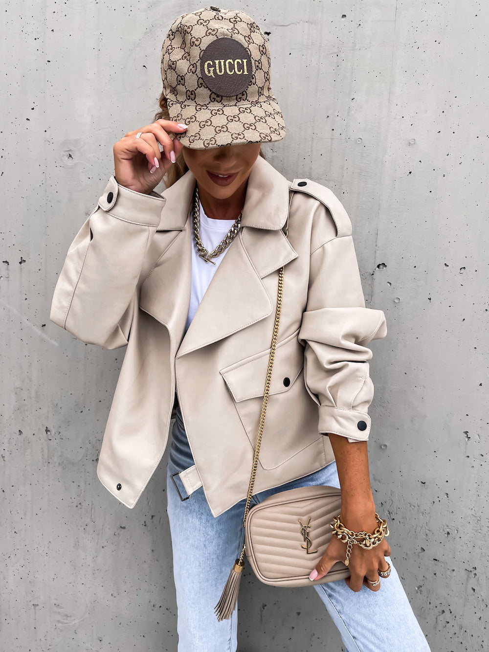 Woman wearing loose black PU leather lapel jacket