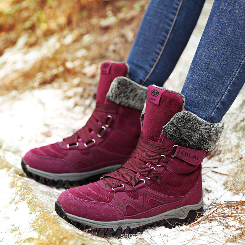 Woman wearing black lace-up winter ankle boots