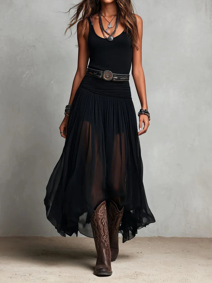 Woman wearing double layer maxi dress with sheer overlay