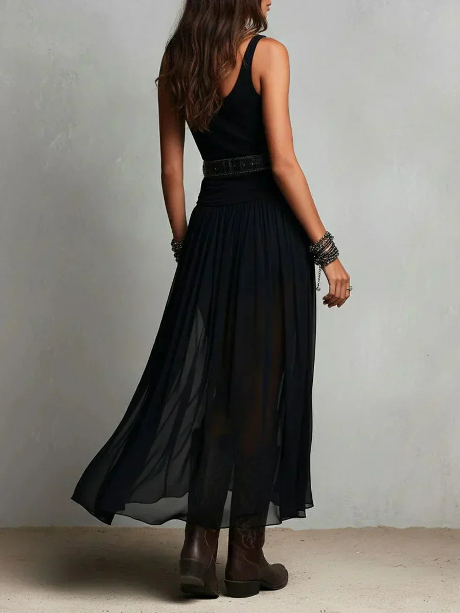 Woman wearing double layer maxi dress with sheer overlay