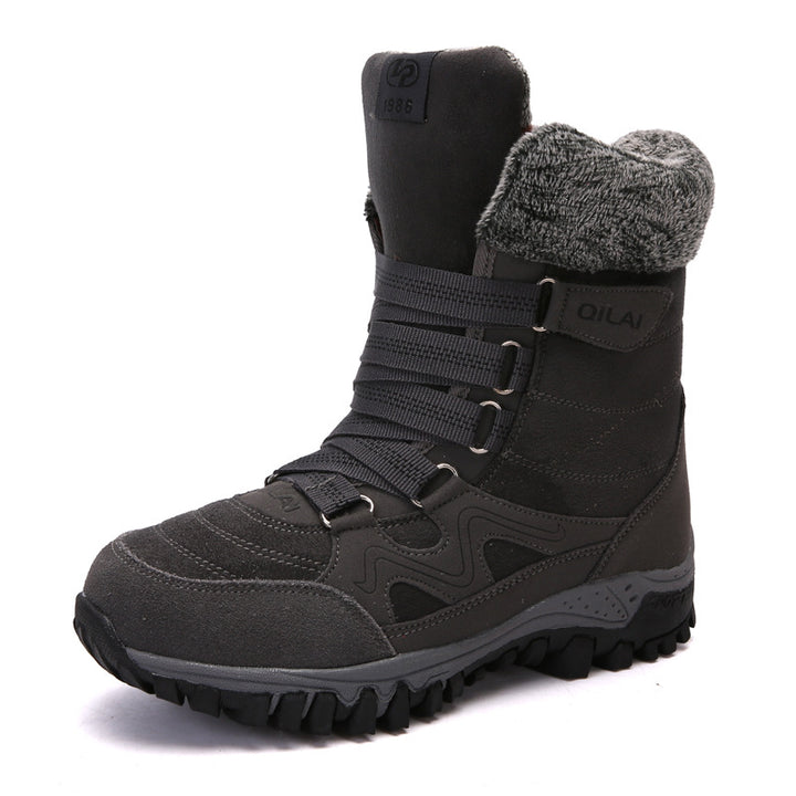Woman wearing black lace-up winter ankle boots