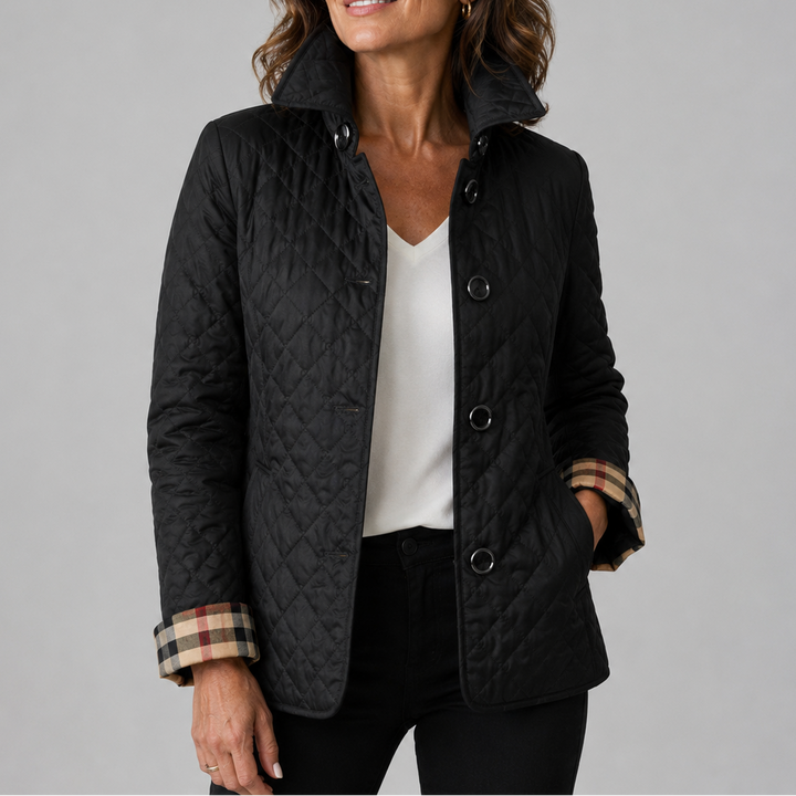 Woman wearing quilted button jacket with stand collar