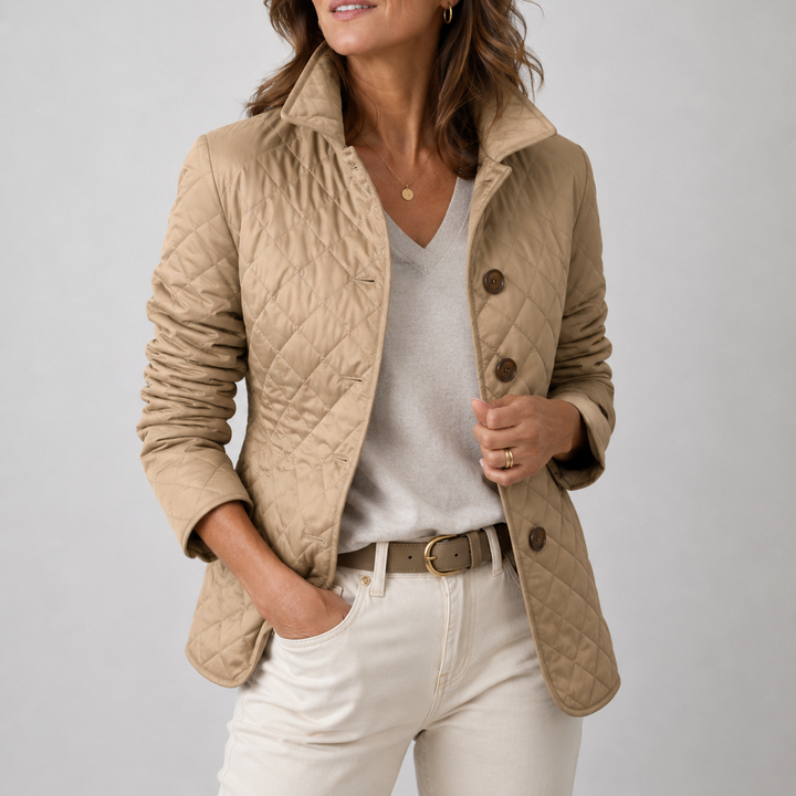 Woman wearing quilted button jacket with stand collar