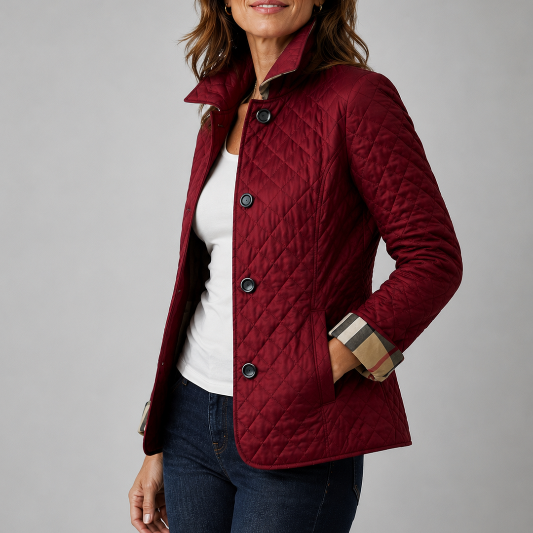 Woman wearing quilted button jacket with stand collar
