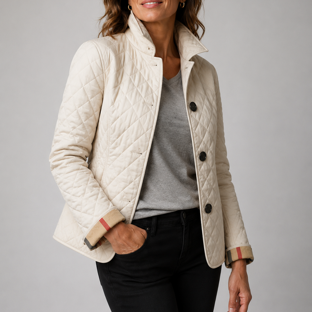 Woman wearing quilted button jacket with stand collar
