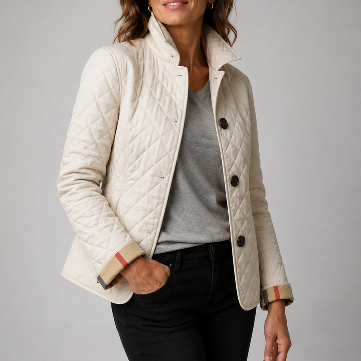 Woman wearing quilted button jacket with stand collar