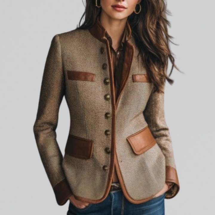 Woman wearing brown textured tailored jacket with sharp collar