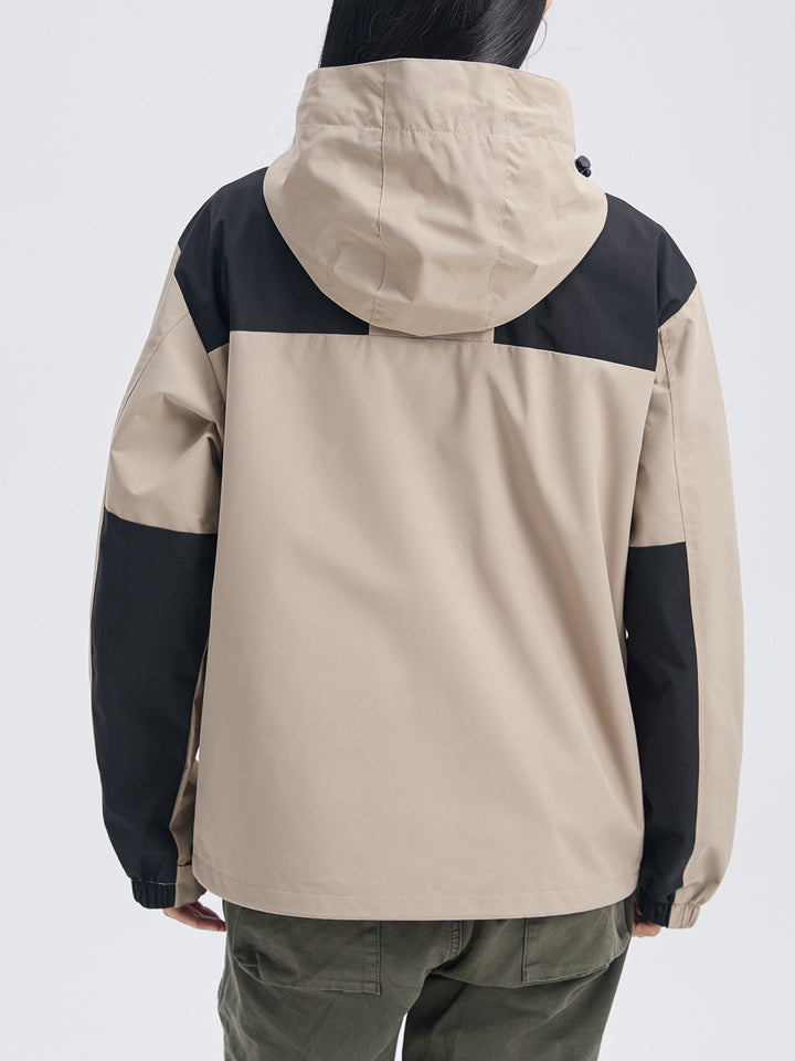 Woman wearing hooded 3-in-1 winter jacket
