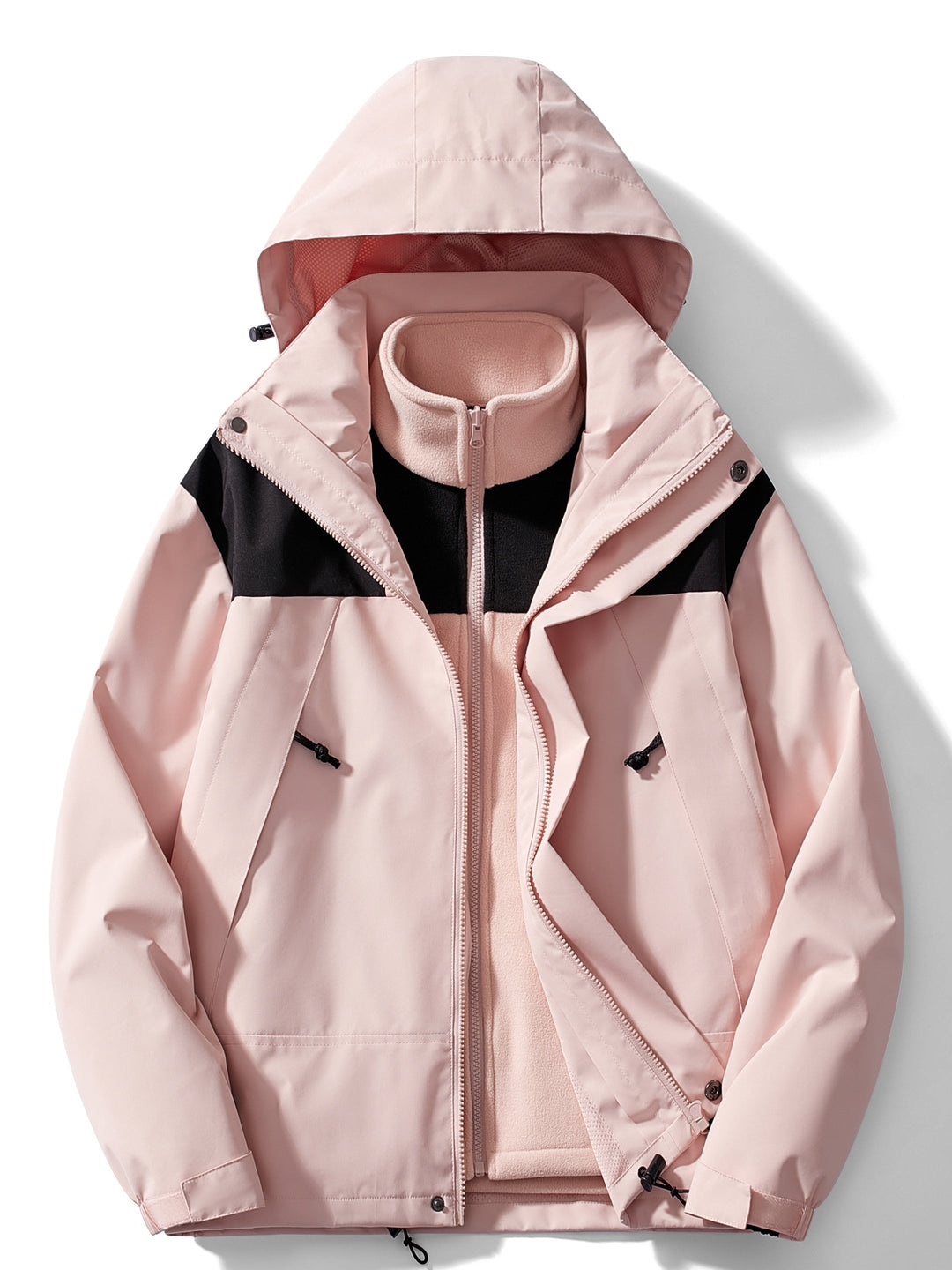 Woman wearing hooded 3-in-1 winter jacket