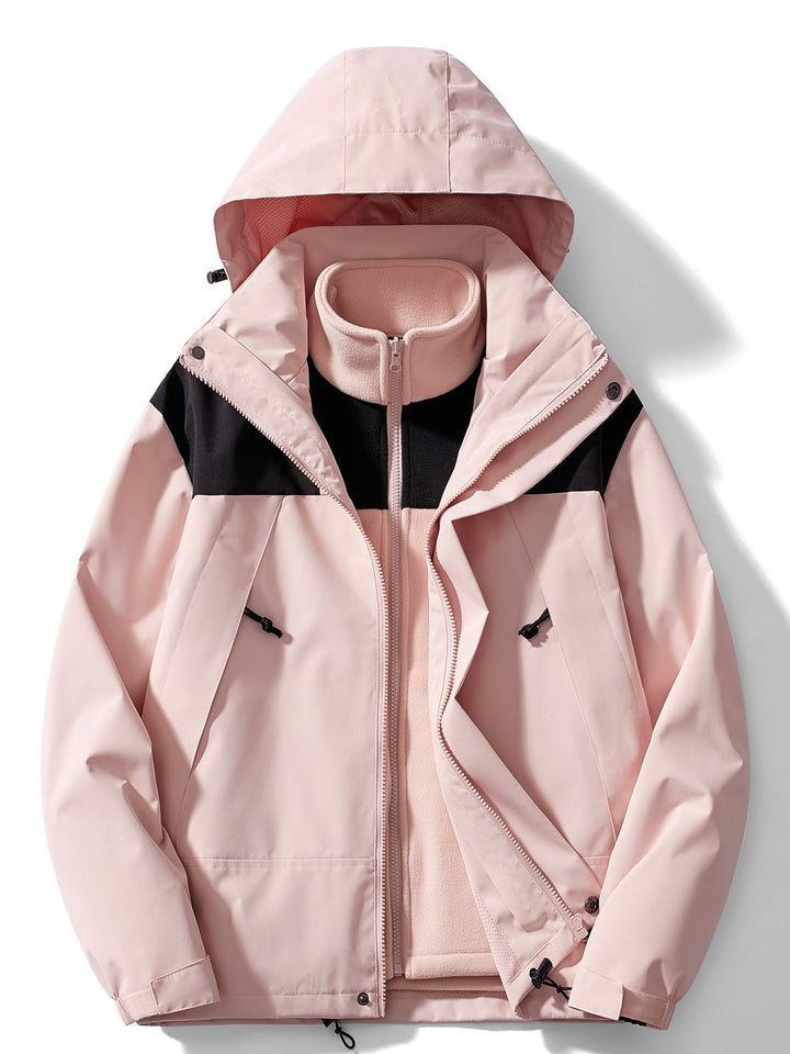 Woman wearing hooded 3-in-1 winter jacket