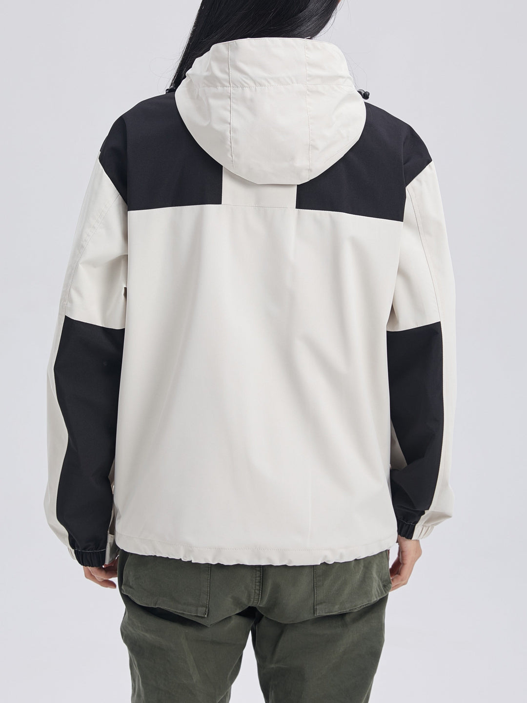 Woman wearing hooded 3-in-1 winter jacket