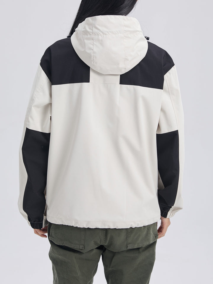 Woman wearing hooded 3-in-1 winter jacket
