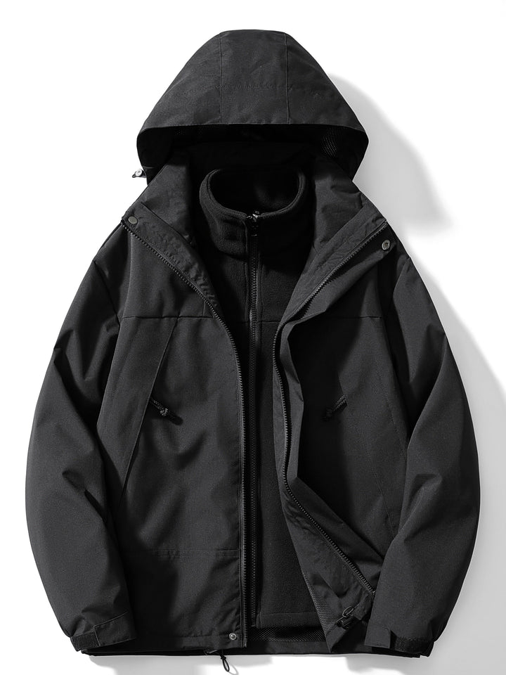 Woman wearing hooded 3-in-1 winter jacket