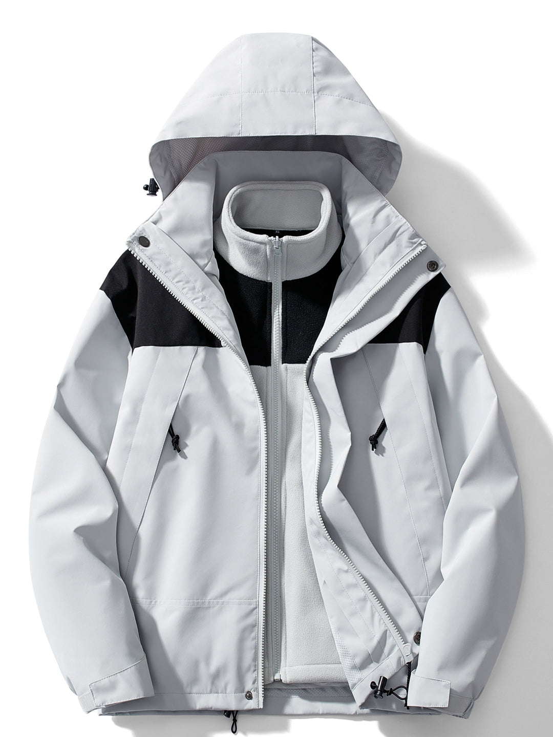 Woman wearing hooded 3-in-1 winter jacket