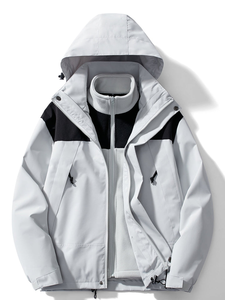 Woman wearing hooded 3-in-1 winter jacket