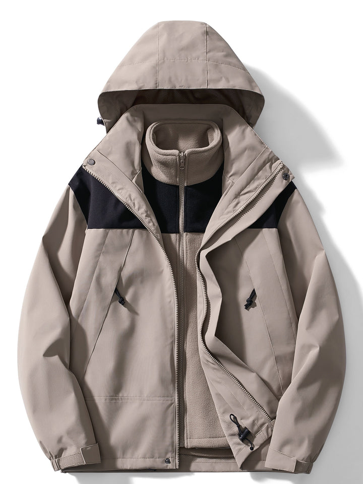 Woman wearing hooded 3-in-1 winter jacket