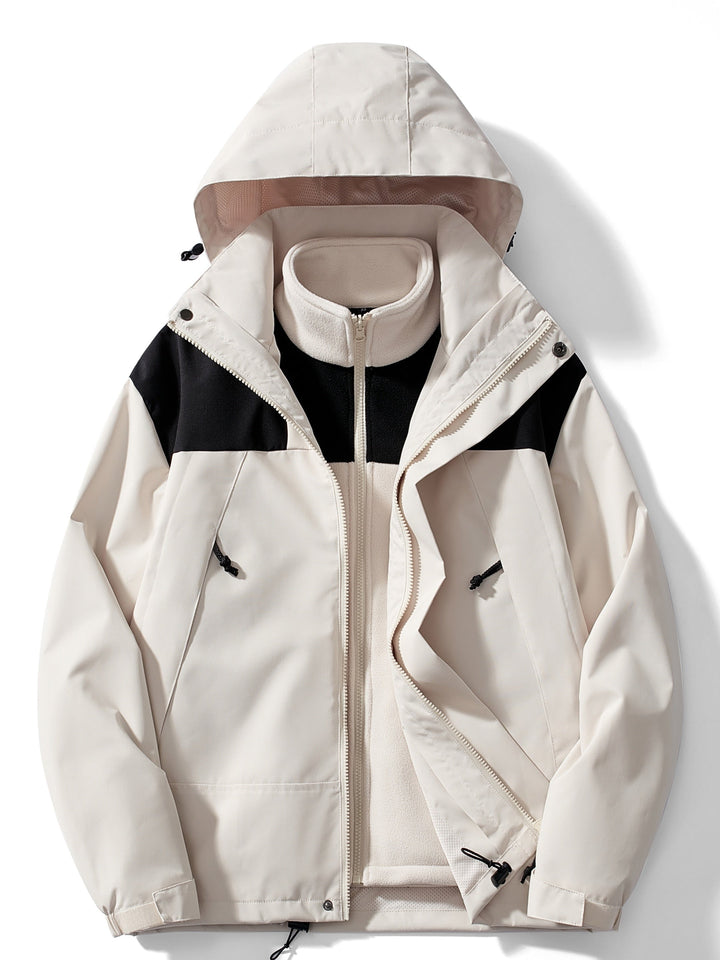 Woman wearing hooded 3-in-1 winter jacket