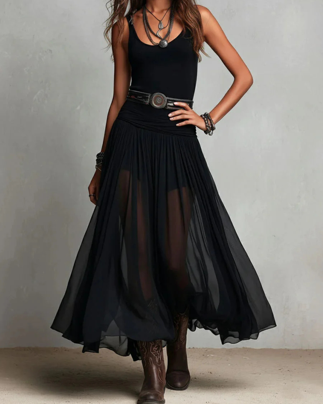 Woman wearing double layer maxi dress with sheer overlay