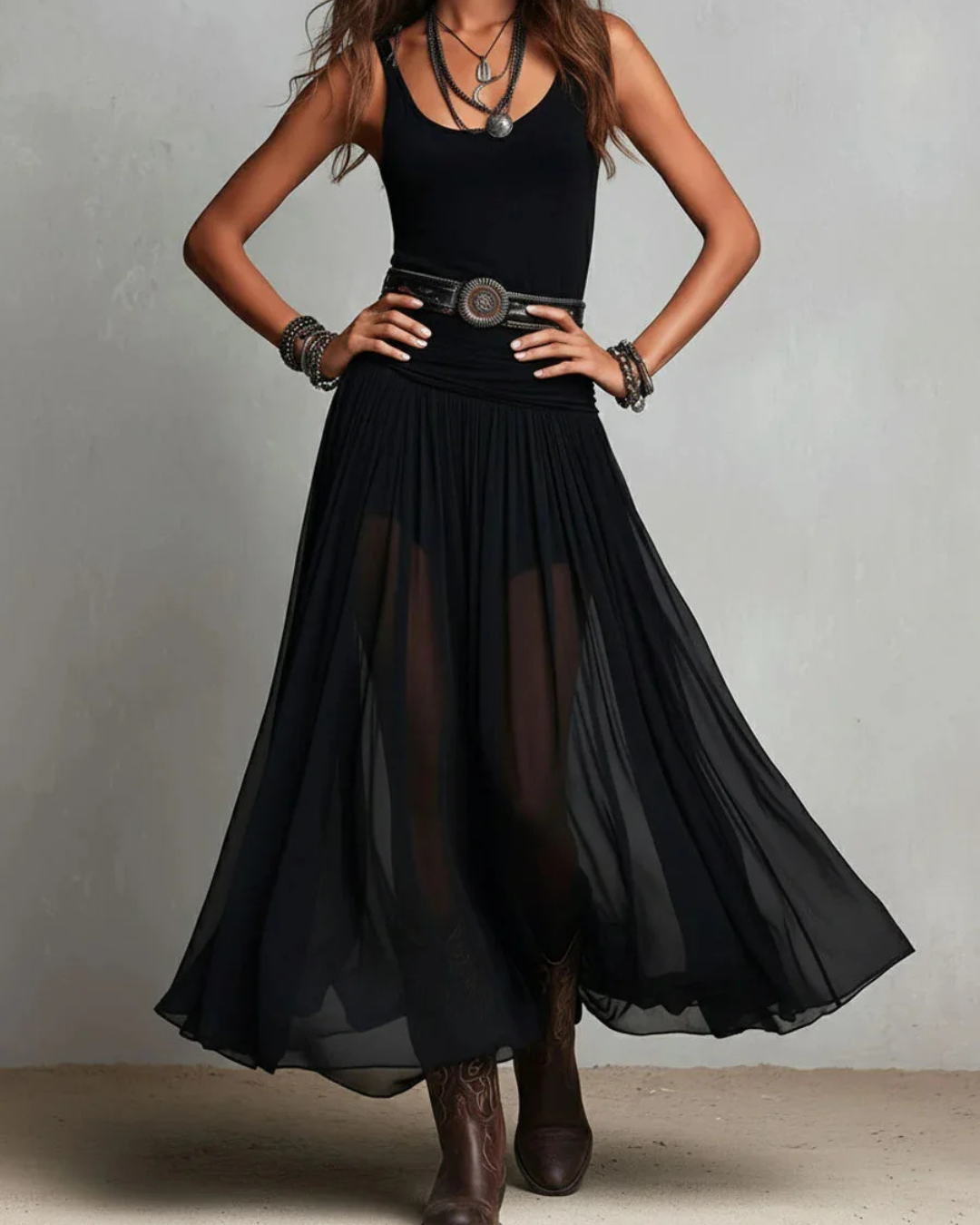 Woman wearing double layer maxi dress with sheer overlay