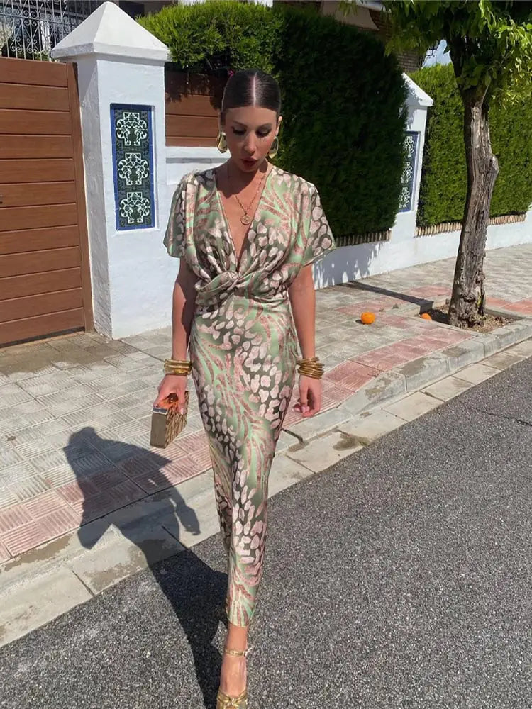 Woman wearing V-neck wrap maxi dress