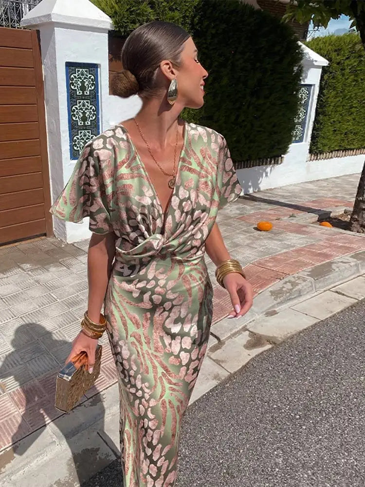 Woman wearing V-neck wrap maxi dress