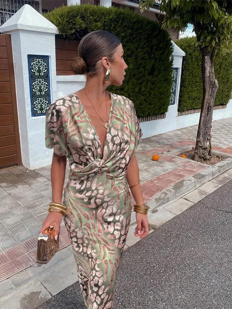 Woman wearing V-neck wrap maxi dress