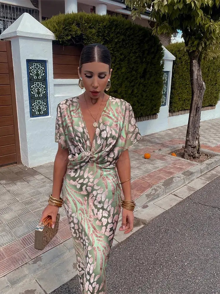 Woman wearing V-neck wrap maxi dress