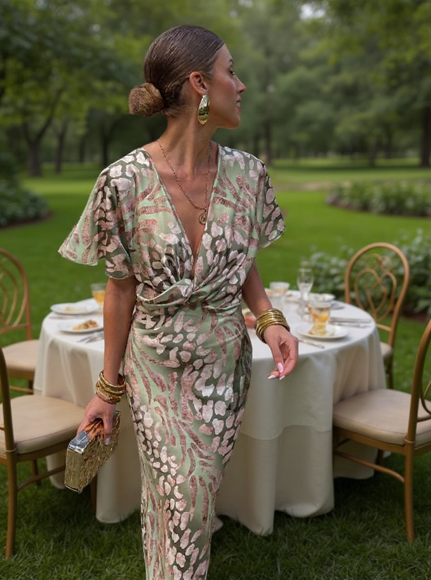 Woman wearing V-neck wrap maxi dress