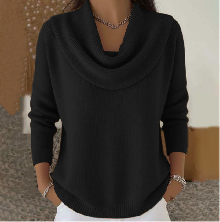Woman wearing cowl neck knit sweater with long sleeves