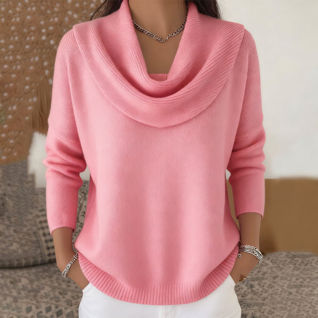 Woman wearing cowl neck knit sweater with long sleeves