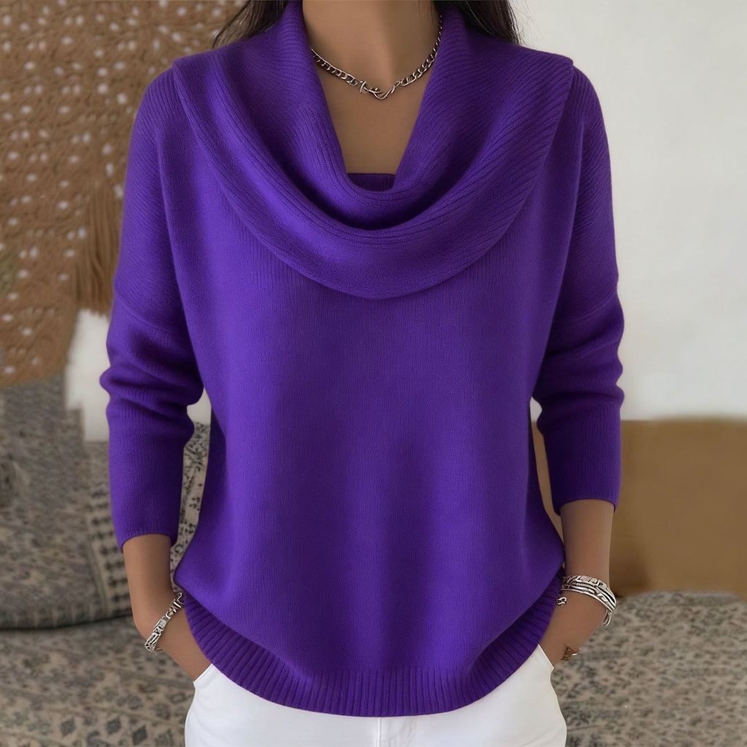 Woman wearing cowl neck knit sweater with long sleeves