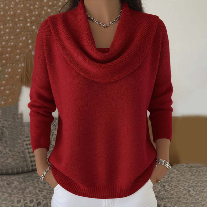 Woman wearing cowl neck knit sweater with long sleeves