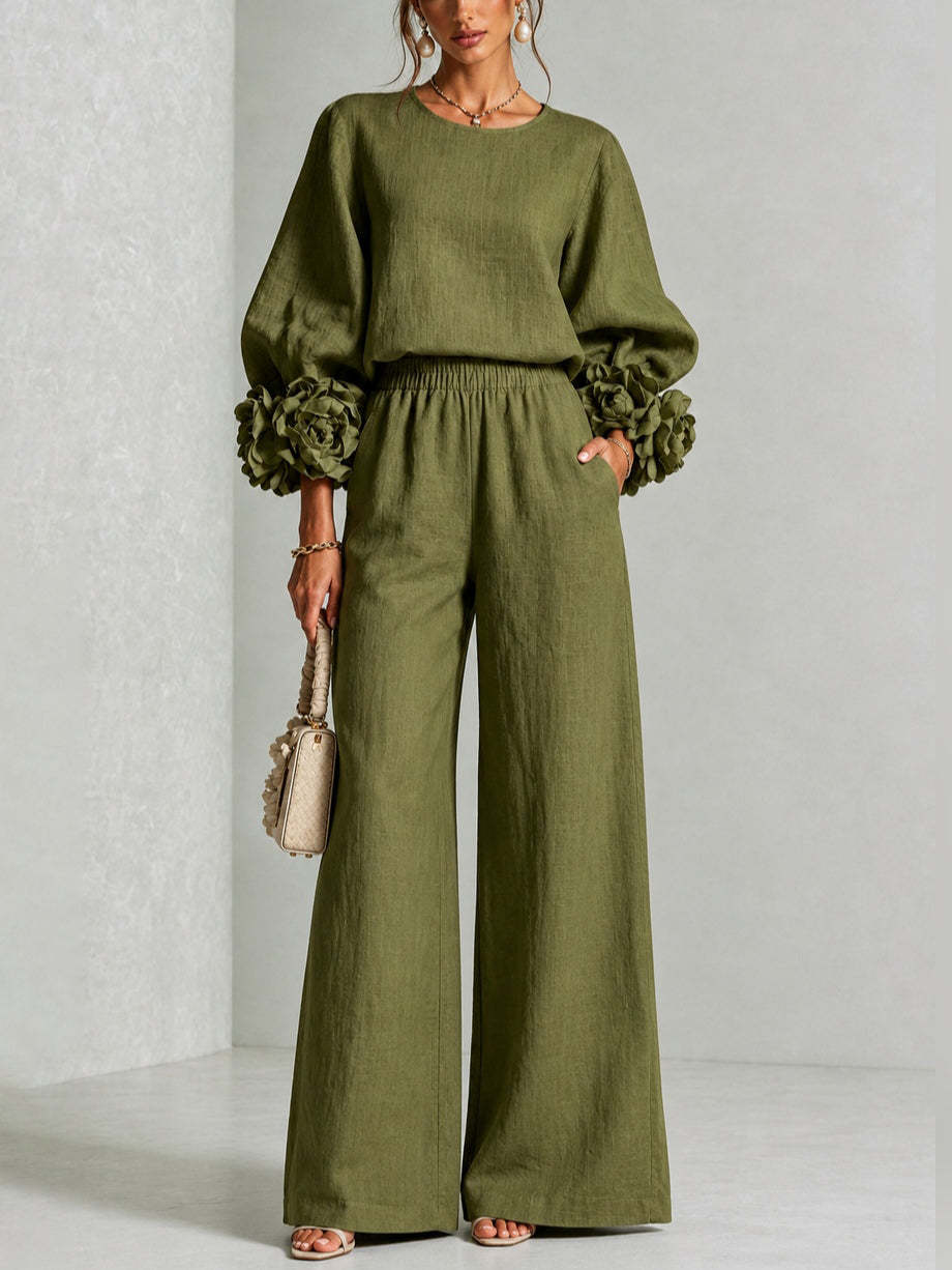 Woman wearing floral two-piece set with wide-leg pants