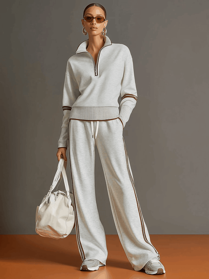 Woman wearing wide leg pants and blouse two-piece set