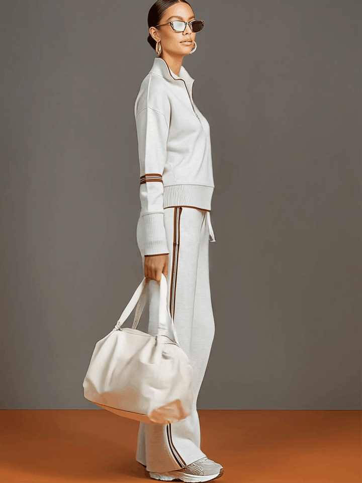 Woman wearing wide leg pants and blouse two-piece set