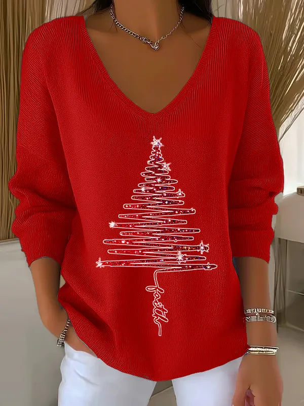 Woman wearing V-neck Christmas sweater with festive print