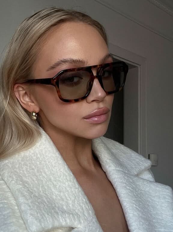 Sunglasses | Elegant Design | UV Protection | Fashionable Accessory for Any Outfit