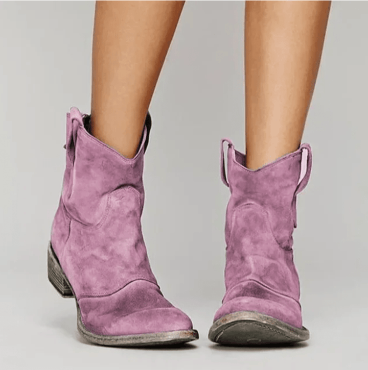 Woman wearing block heel orthopedic boots with side zip