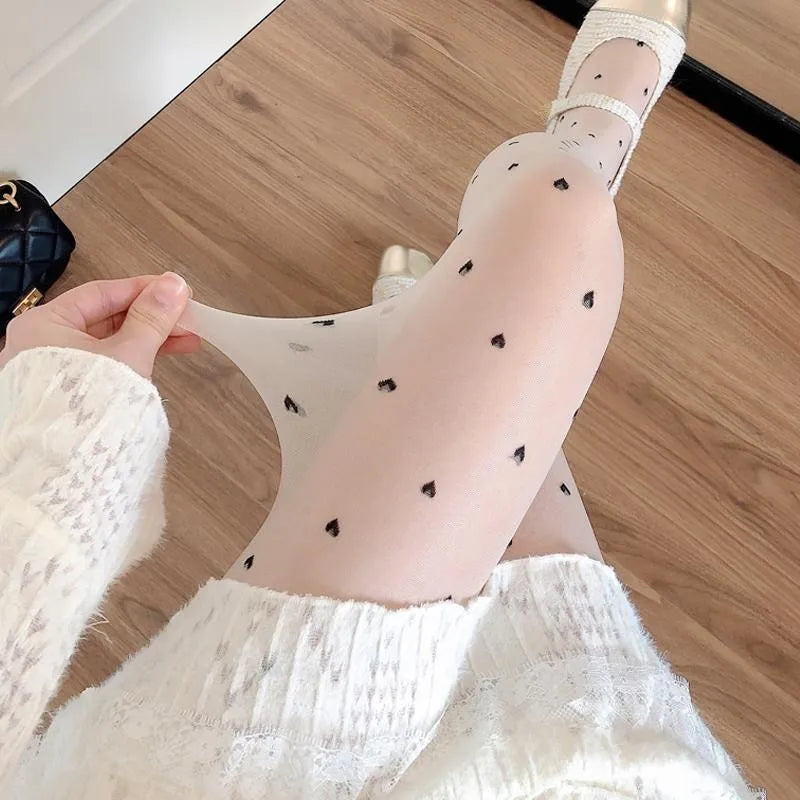 Stylish women's tights in heart and dot style