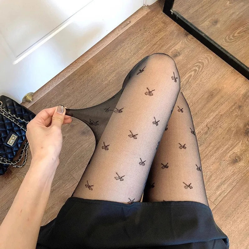 Stylish women's tights in heart and dot style