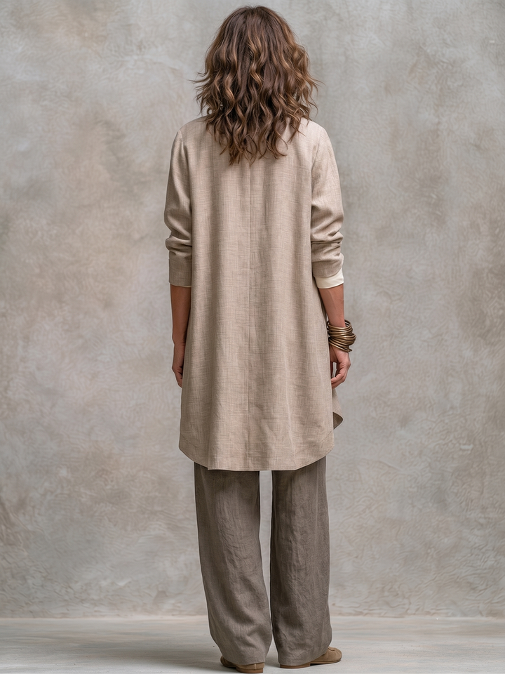 Woman wearing taupe three-piece wide leg pant suit set