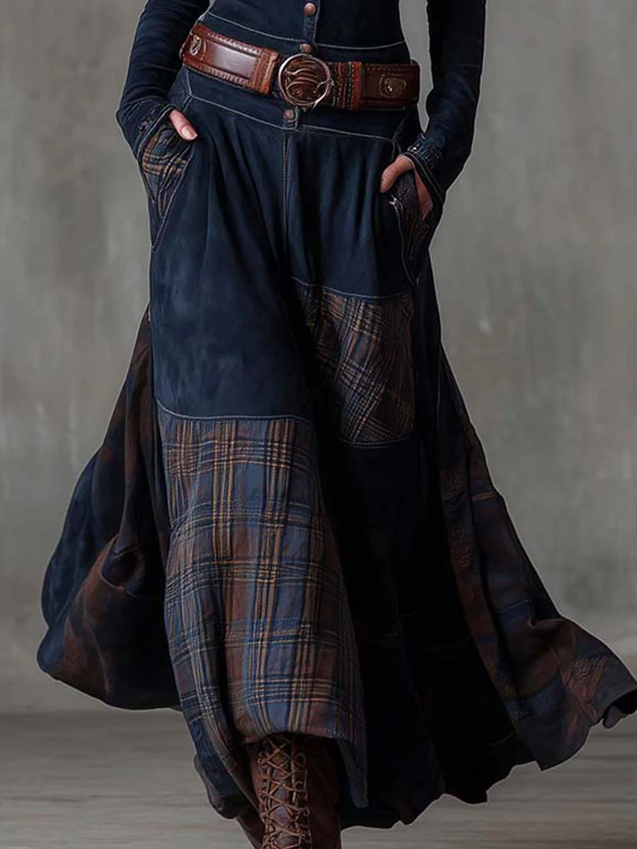 Woman wearing plaid patchwork maxi dress with button front