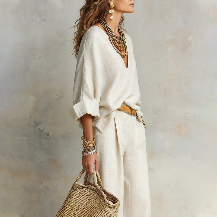 Woman wearing relaxed V-neck two piece set with wide-leg trousers