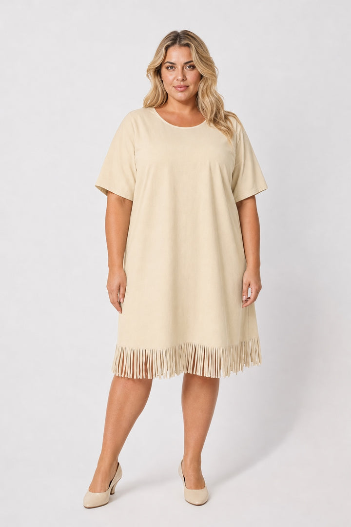 Brianna Boho Fringe Dress in beige – front view on a plus-size model