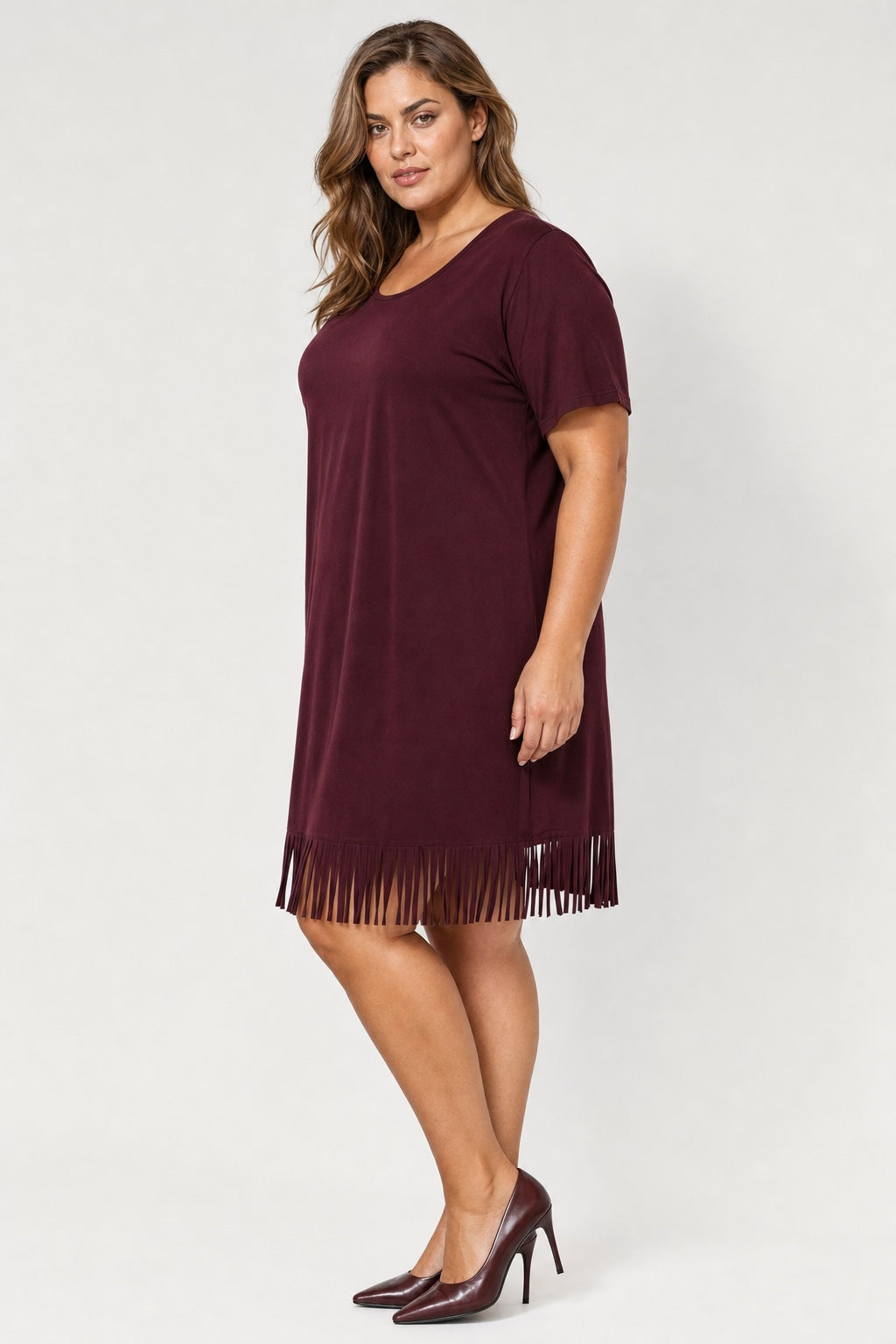 Brianna Boho Fringe Dress in dark red – side view on a plus-size model