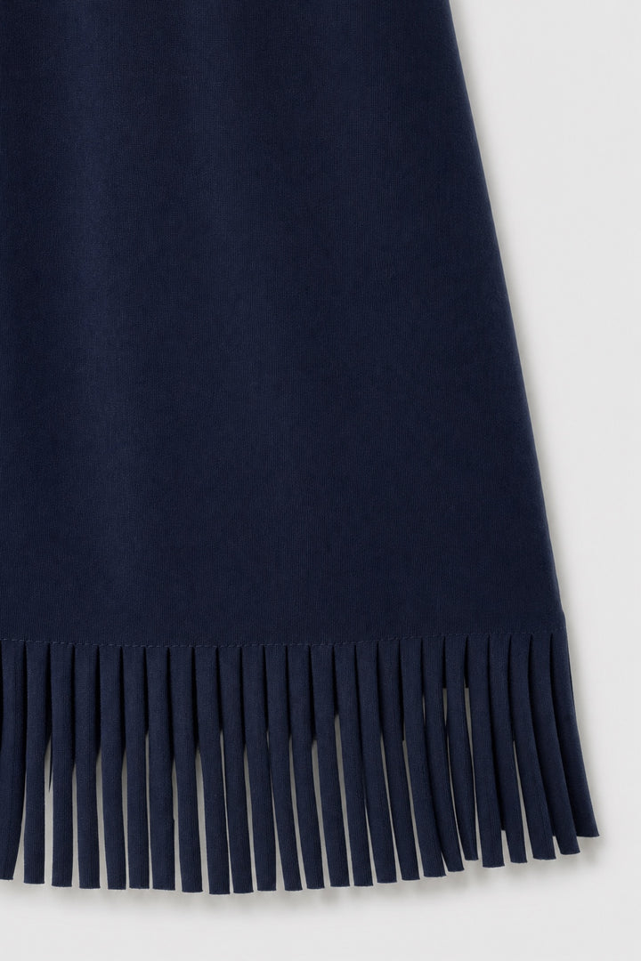 Brianna Boho Fringe Dress in navy blue – close-up of the fringe hem and soft fabric