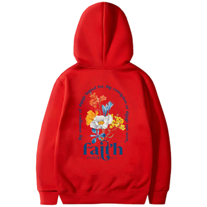 Woman wearing Bible verse graphic hoodie with long sleeves