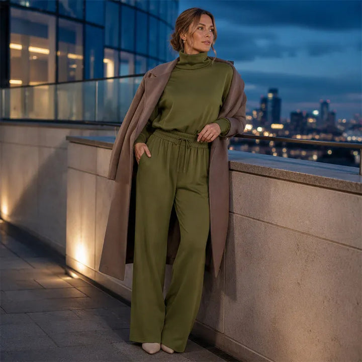 Woman wearing black turtleneck two-piece set with wide-leg trousers