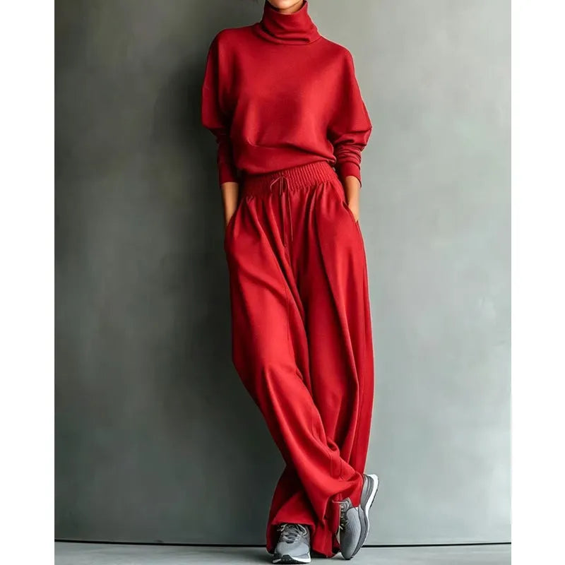 Woman wearing black turtleneck two-piece set with wide-leg trousers